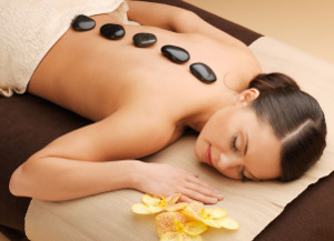 17601688-picture-of-woman-in-spa-salon-with-hot-stones-massage-stone-hot